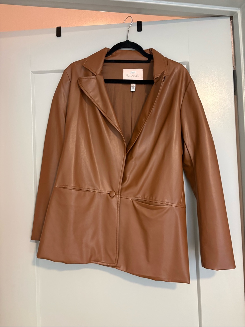 Women’s light brown leather blazer